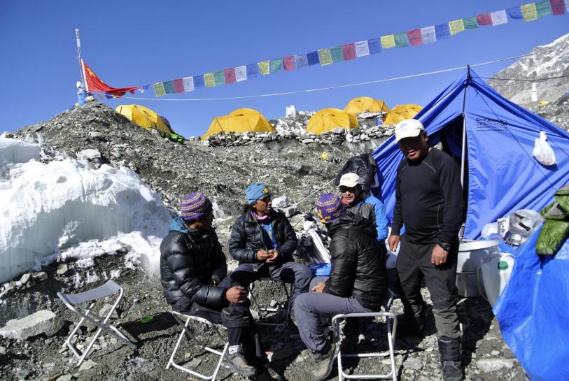 Sherpas sit at the Mount Everest base camp in April 2014. Reuters/Phurba Tenjing Sherpa