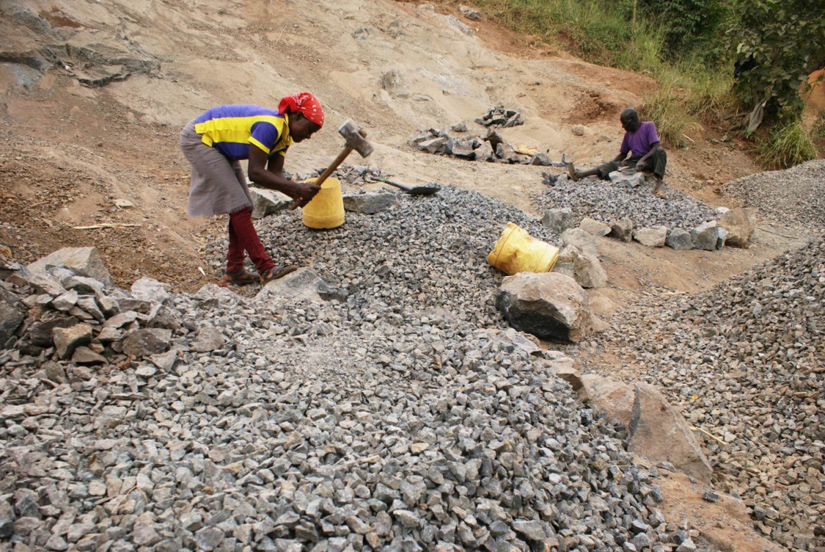 A woman works at a quarry in Muiru village, central Kenya on July 16, 2019. Thomson Reuters Foundation/Kagondu Njagi