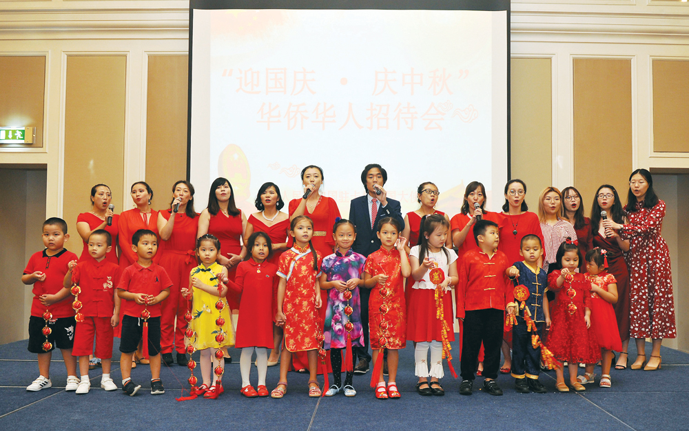 Chinese community members during a reception organised to mark the 70th anniversary of the founding of the People’s Republic of China, in Doha yesterday. Abdul Basit / The Peninsula