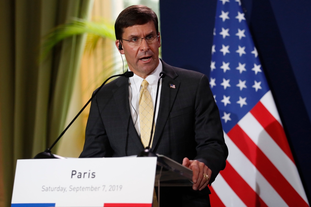 FILE PHOTO: US Secretary of Defense Mark Esper (L) holds a press conference with French army minister following their meeting at the French Defence ministry in Paris. AFP / Zakaria ABDELKAFI