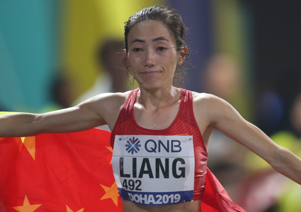 China's Rui Liang celebrates winning gold REUTERS/Ibraheem Al Omari