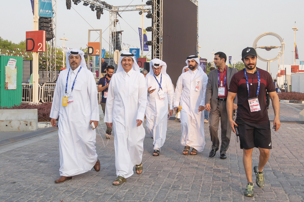 Ooredoo employees heading to Khalifa International Stadium along with Group CEO, Sheikh Saud bin Nasser Al Thani (second left). 