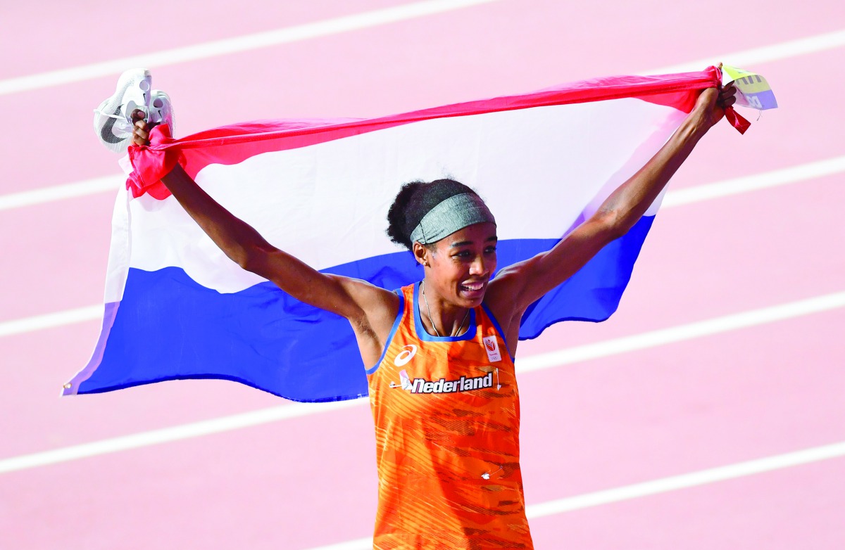 Sifan Hassan of the Netherlands celebrates after winning the women’s 1,500 metres final yesterday. Pictures: Abdul Basit / The Peninsula