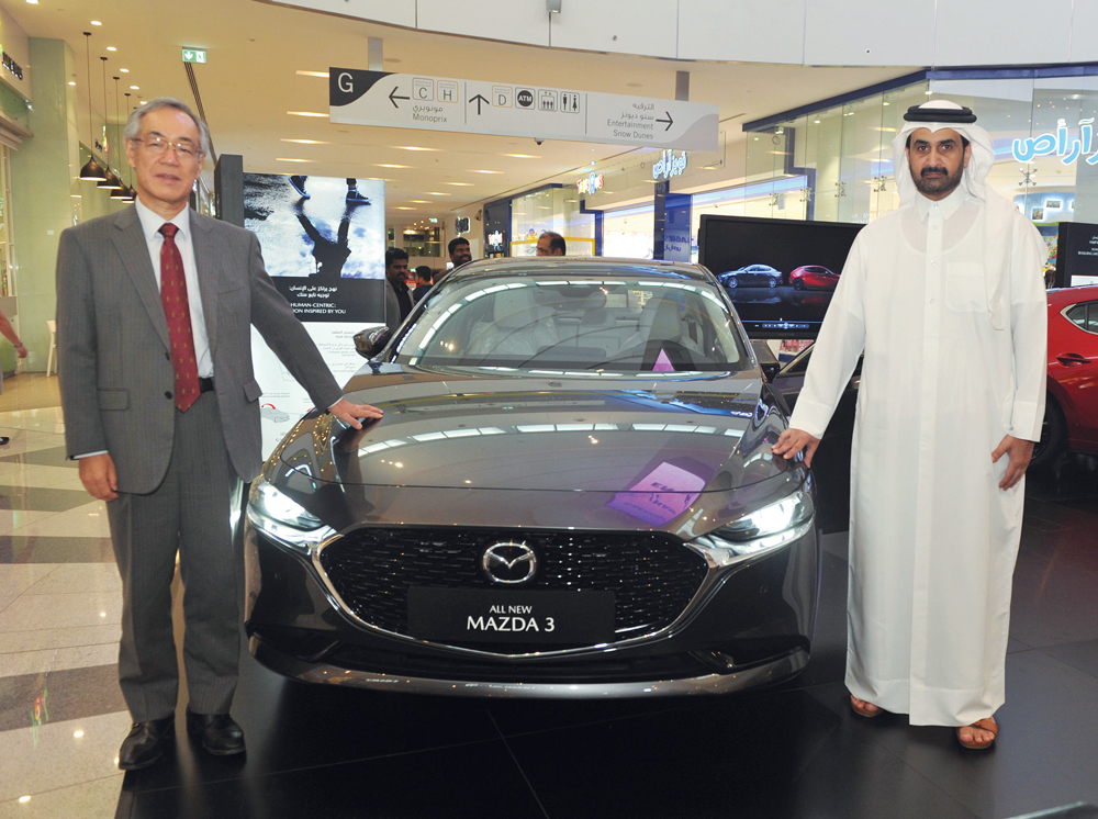 Sheikh Ahmad bin Nasser Al Thani (right), President Director of National Car Company; and the Ambassador of Japan to Qatar, Kazuo Sunaga, at the launch event of the all-new Mazda 3. 
Pic: Abdul Basit/The Peninsula
