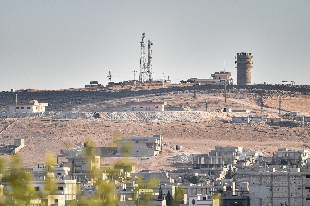 FILE PHOTO: Turkey near the town of Suruc shows a US observation post near the Syrian town of Kobani Kobane where the Pentagon said an explosion occurred 