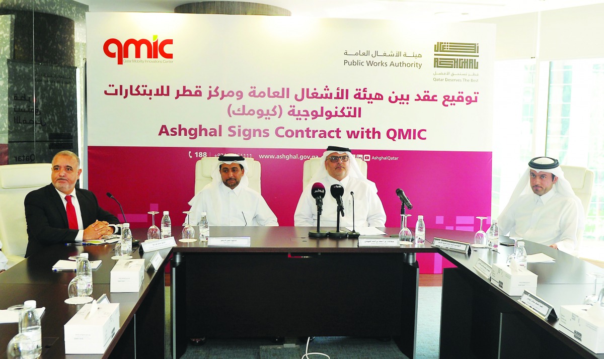 The President of Public Works Authority, Dr. Eng. Saad bin Ahmad Al Muhannadi; President of Qatar University, Dr. Hassan bin Rashid Al Derham; and Executive Director & CEO of QMIC, Dr. Adnan Abu Dayya, during the signing ceremony at Ashghal head office, y