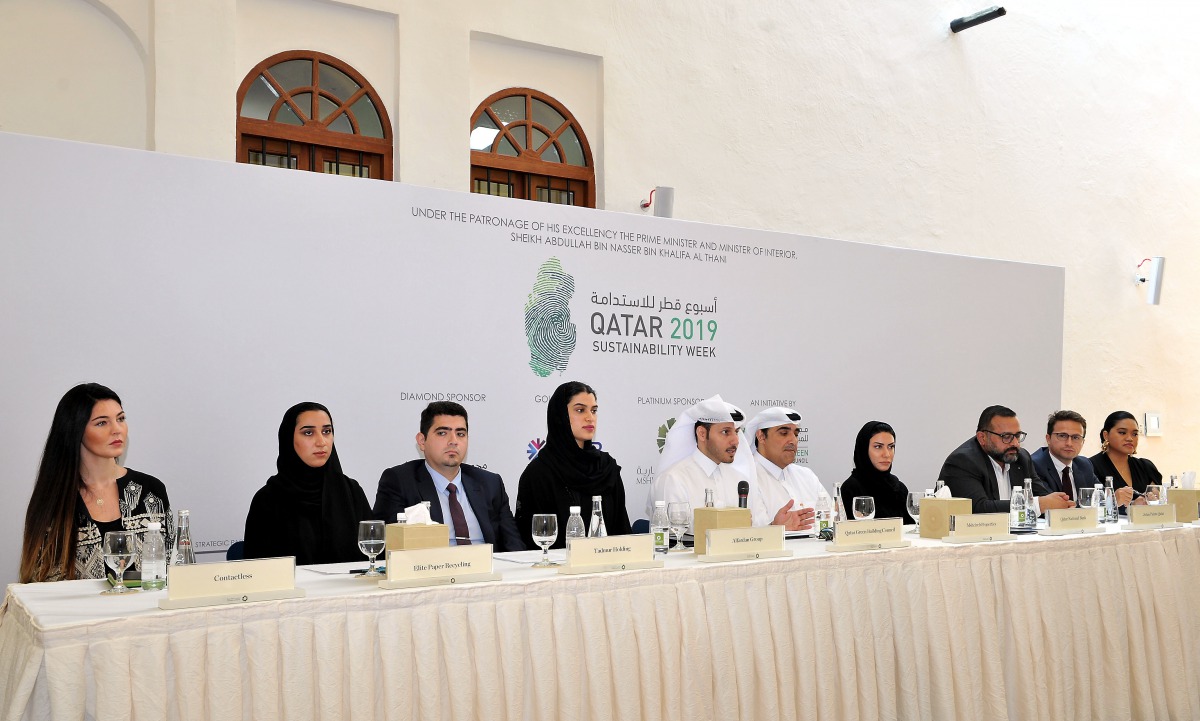 The Director of Qatar Green Building Council, Eng Meshal Al Shamari (fifth left), with officials of the sponsoring companies of Qatar Sustainability Week 2019, addressing a press briefing at the Msheireb Museums’ Bin Jelmood House in Doha, yesterday.  Als