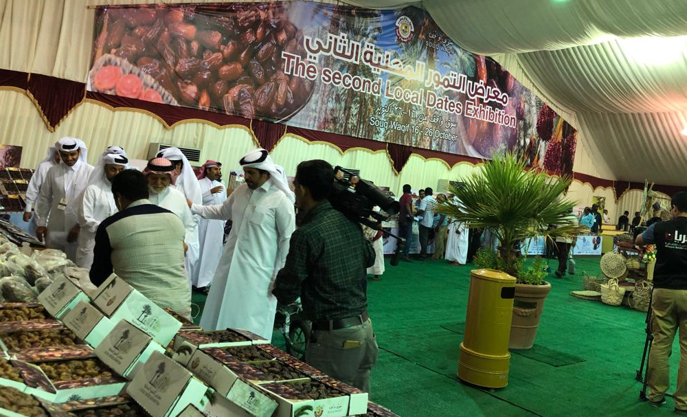 People visiting the Second Local Dates Exhibition, organised by the Ministry of Municipality and Environment, at Souq Waqif, yesterday.