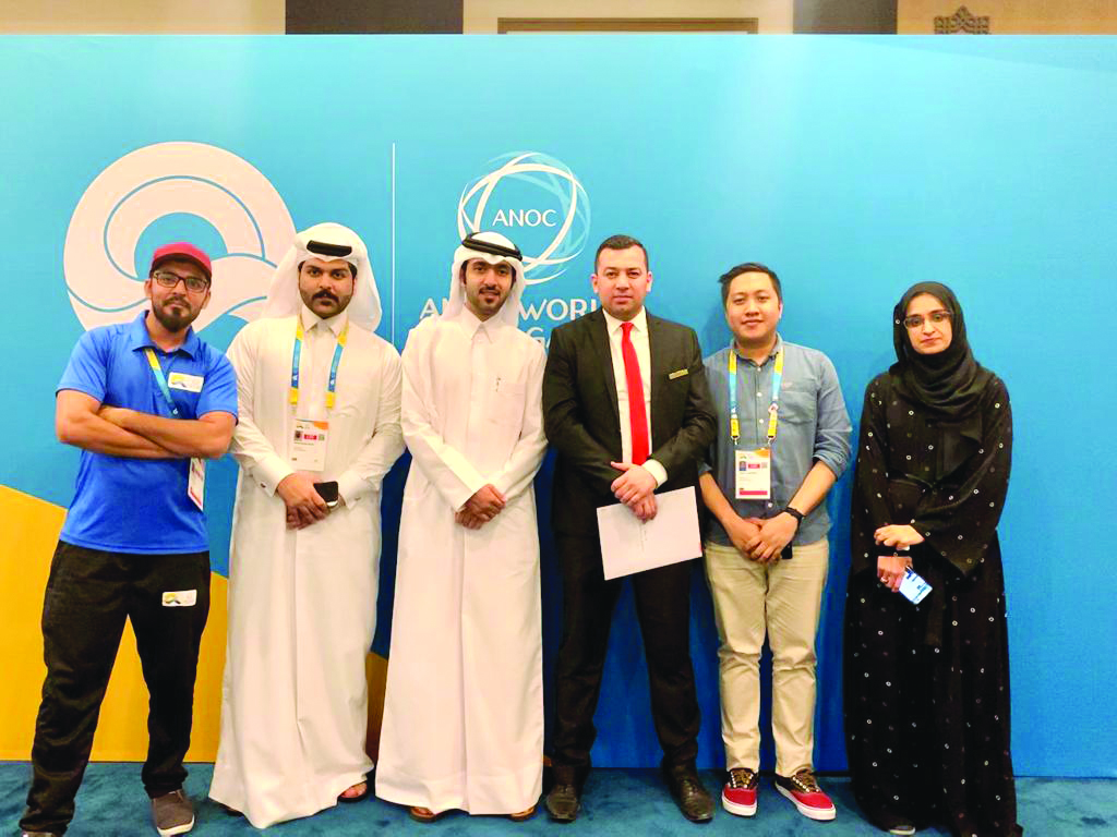 The participants in the ANOC World Beach Games with the representatives of Ezdan Hotel West Bay during the honouring ceremony. 
