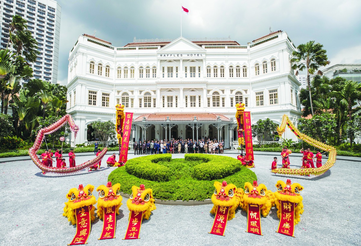 Artistes performing in front of the guest during the reopening ceremony of Raffles Hotel Singapore.