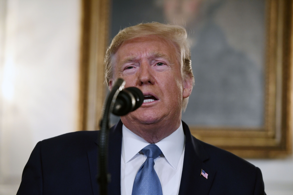 US President Donald Trump speaks about Syria in the Diplomatic Reception Room at the White House in Washington, DC, October 23, 2019. AFP / Saul Loeb 