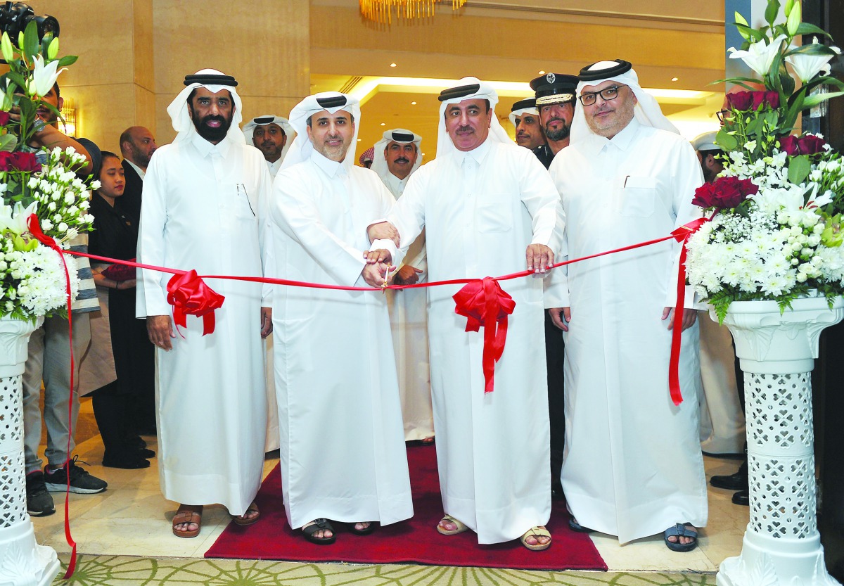 The Minister of Transport and Communications, H E Jassim bin Saif Al Sulaiti (second right), cutting a ribbon with the Minister of Municipality and Environment, H E Abdulla bin Abdulaziz bin Turki Al Subaie (second left); President of Planning and Statist