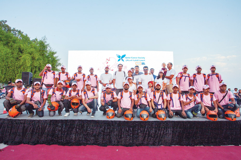 Talabat Qatar employees during the launching of Think Pink charity campaign.