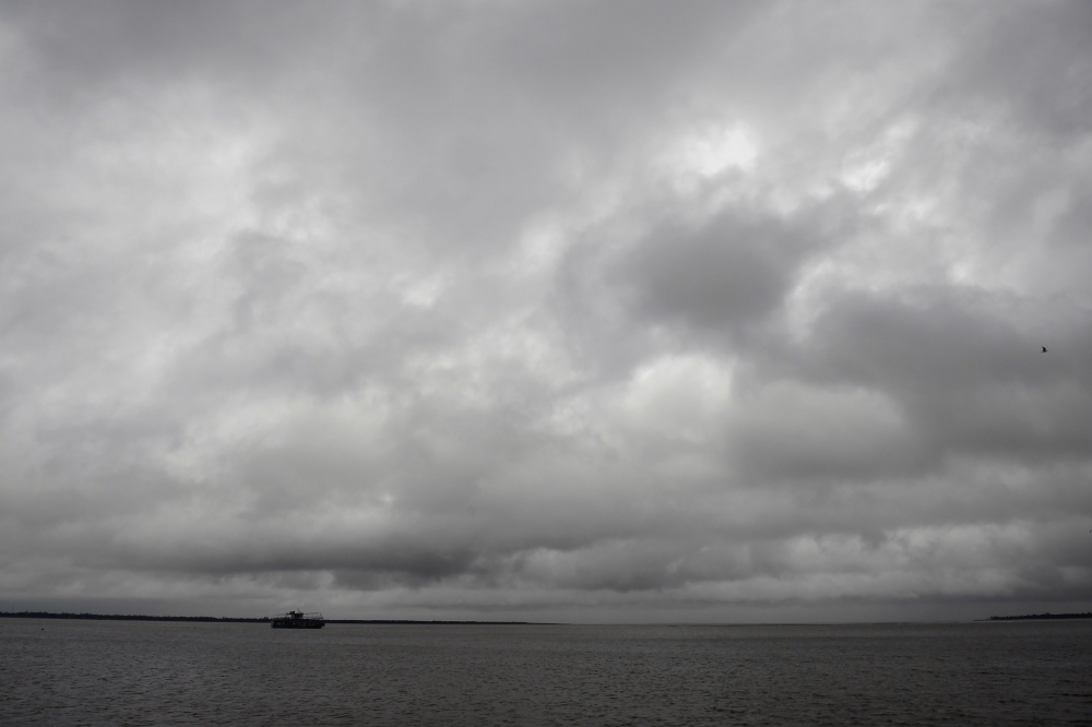  Storm clouds of the approaching Cyclone Bulbul are pictured from Kakdwip in West Bengal state on November 9, 2019.   AFP / Dibyangshu SARKAR