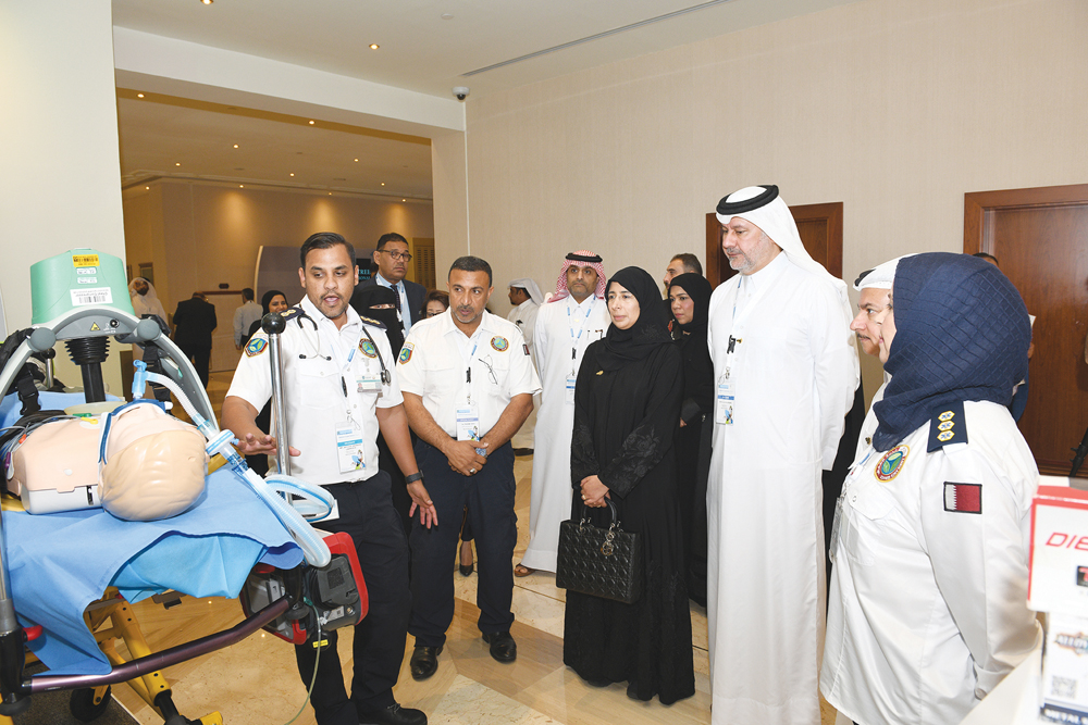 H E Dr Hanan Mohamed Al Kuwari, Minister of Public Health, with Dr Abdulla Al Ansari, Acting Chief Medical Officer at HMC, and other officials during a tour of the Knowledge Zone held on the sidelines of Qatar’s first Patient Experience Forum at Sheraton 