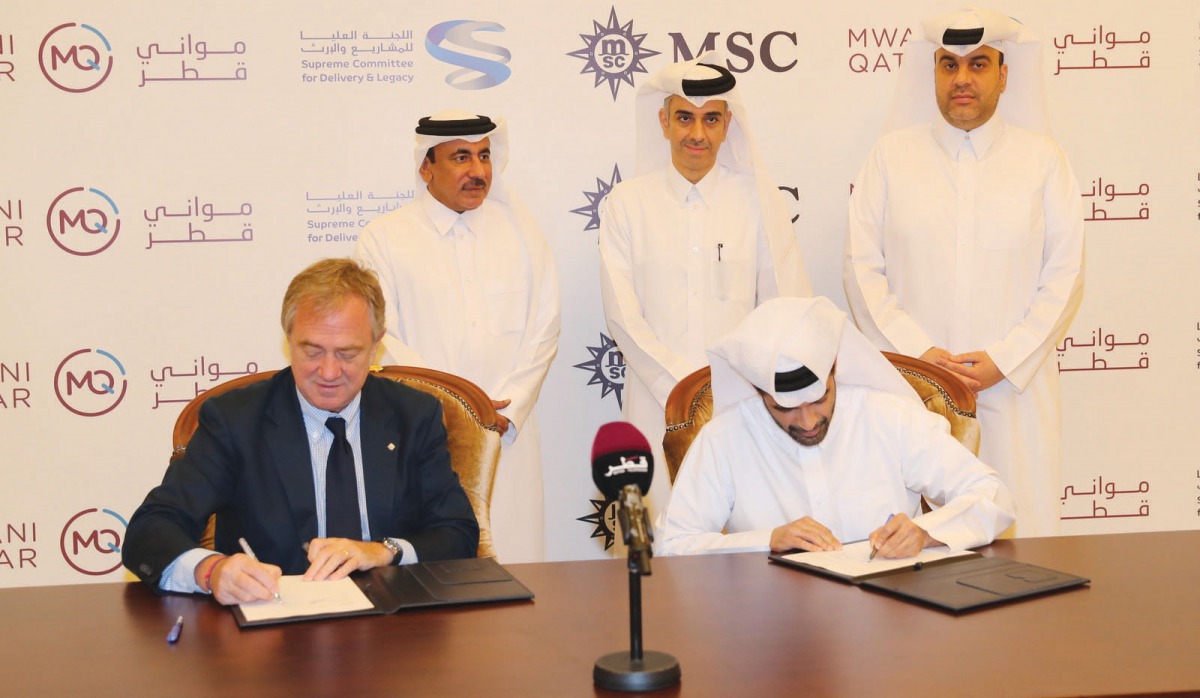 Minister of Transport and Communications, H E Jassim bin Saif Al Sulaiti, witnessing the signing of the agreement by the Secretary-General of the Supreme Committee for Delivery and Legacy, Hassan Al Thawadi, and Pierfrancesco Vago, Executive Chairman, MSC