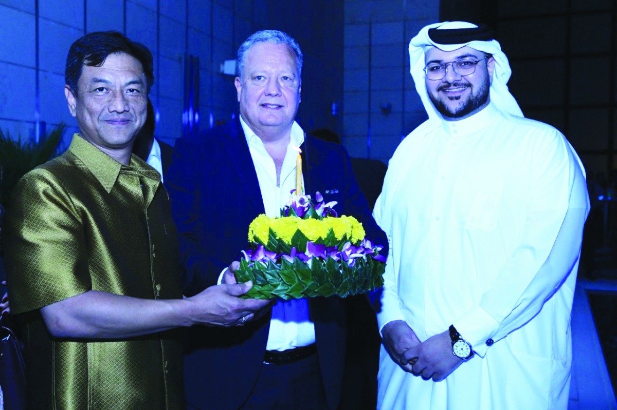 FROM LEFT: Thailand’s Ambassador to Qatar, Nathapol Khantahiran; Gerhard Stutz, Cluster General Manager for Dusit Doha Hotel and Dusit Doha Hotel & Suites in Qatar, and an official from Al Majed Group, during the celebration of Loy Krathong Festival at Du