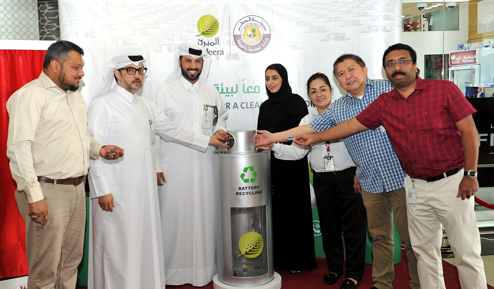 Saeed Mohammed Al Nabit (second left), Executive Director for Administrative Affairs and Human Resources at Al Meera, with other employees of Al Meera, during the launch of Battery Recycling Initiative at the Al Qatifiya branch of Al Meera, yesterday. PIC