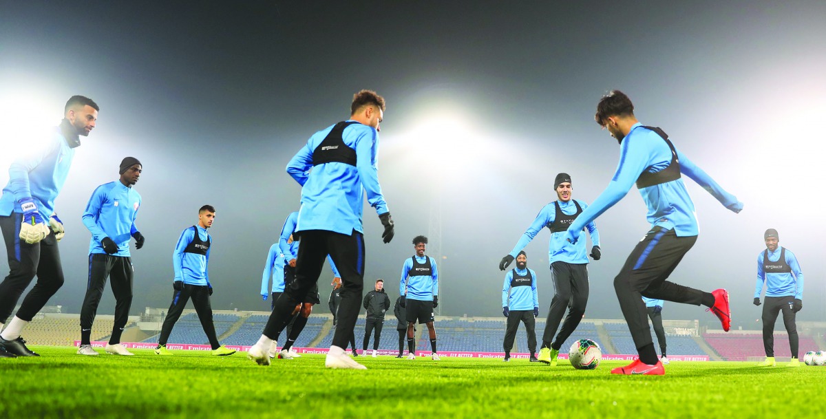 Qatari players in action during a practice session on the eve of their 2022 FIFA World Cup and 2023 Asian Cup joint qualifier against Afghanistan in Tajikistan in this file photo.