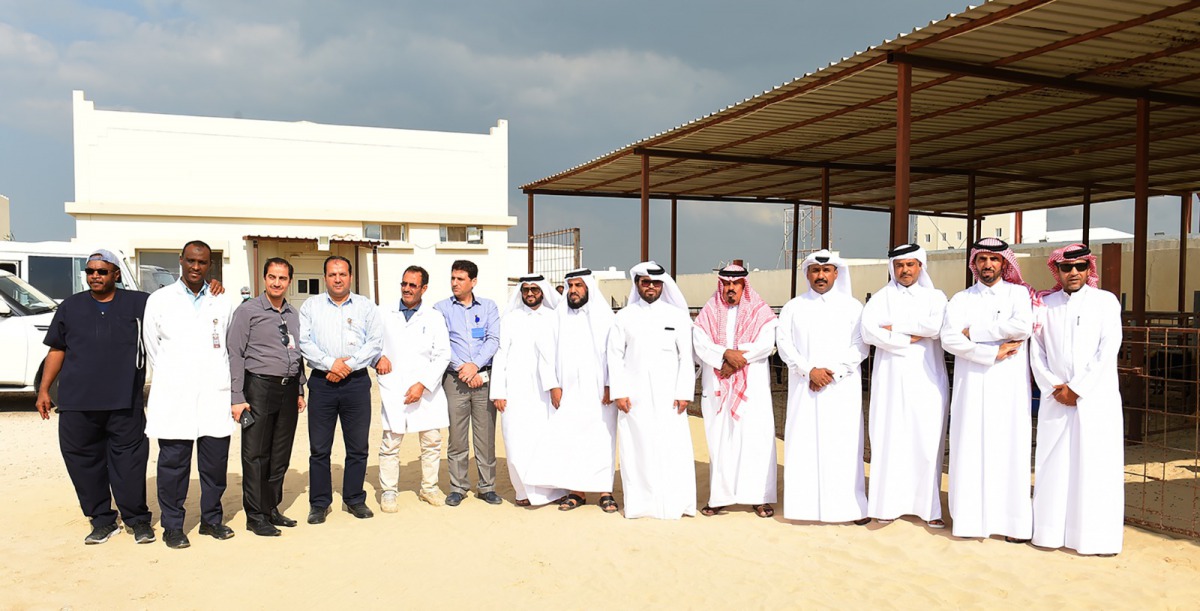 The Director of Livestock Affairs Department, Abdul Aziz Al Ziyara, and Head of Livestock Health Section at the Department, Saleh Jarullah Al Marri, with officials and guests at the opening ceremony of Livestock Market in Al Shamal.