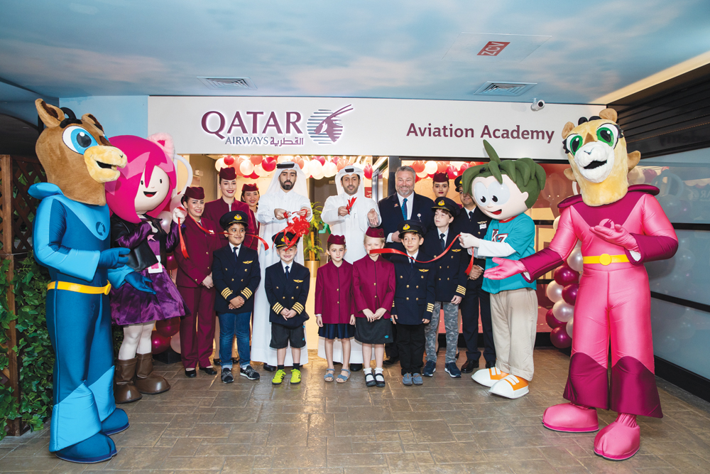 Officials from Qatar Airways and Qatar Entertainment along with children during the opening ceremony of Aviation Academy at KidZania Doha.