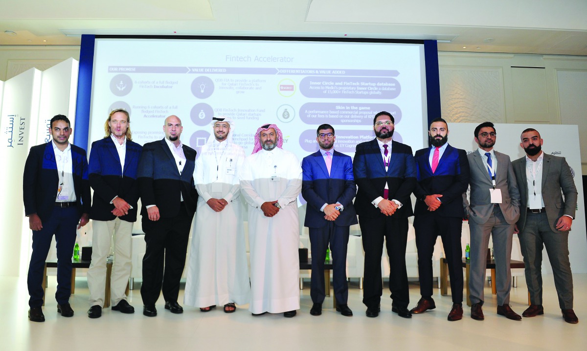 Ibrahim Mohammed Hassan (fourth left), Executive Director, Investment, Qatar Development Bank (QDB), Ibrahim Al Mannai, (fifth left), QDB Executive Director of Advisory & Incubation and other officials from QDB, EY, Speedinvest, and Alchemist pose during 