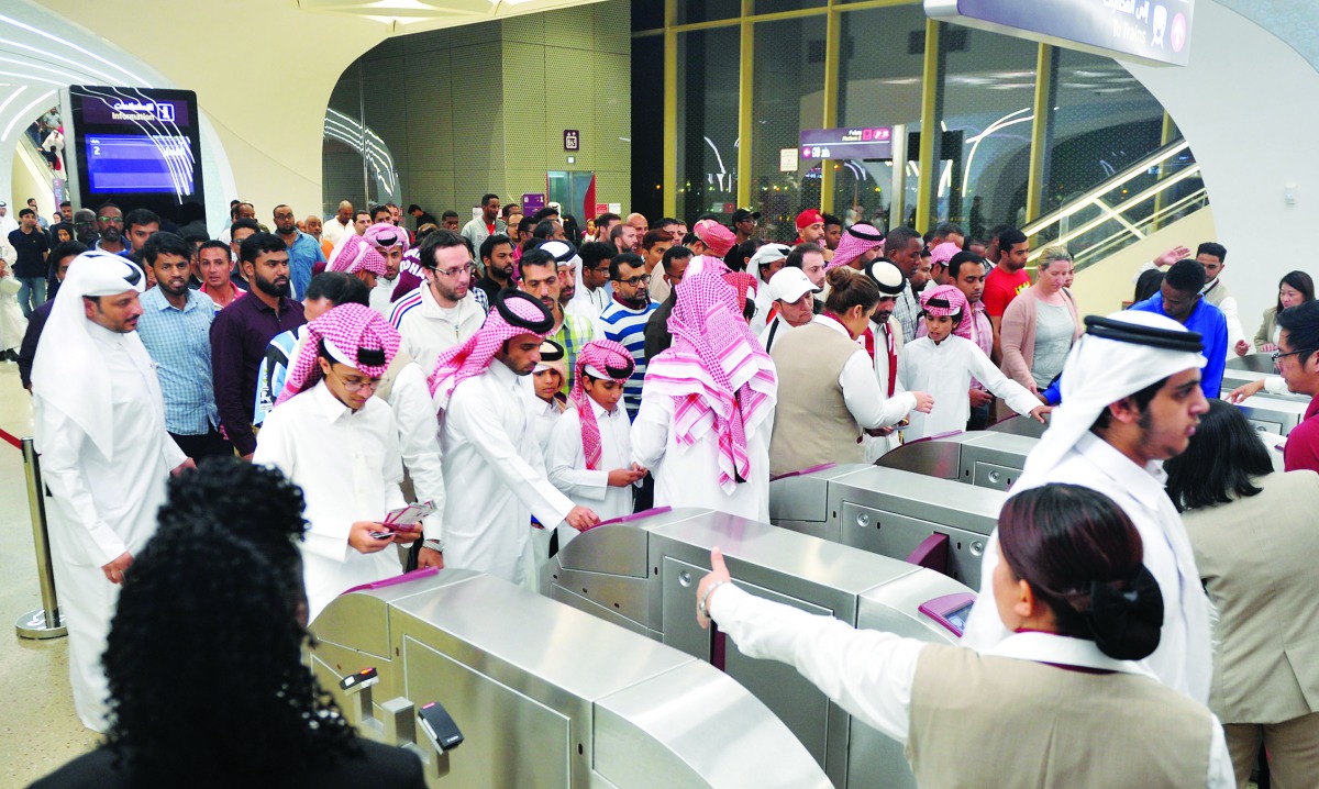 Fans on their way to Al Janoub Stadium for the semi-final match between Qatar and Saudi Arabia, in Al Wakra Metro Station yesterday. Pic: Abdul Basit The Peninsula