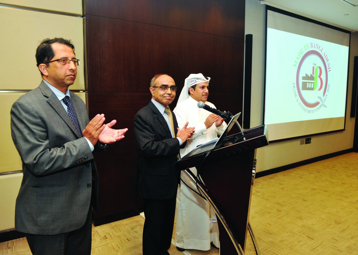 Ashud Ahmed (centre), Ambassador of Bangladesh to Qatar, with other officials at the launch of the exhibition logo, yesterday. Pic: Abdul Basit/The Peninsula  