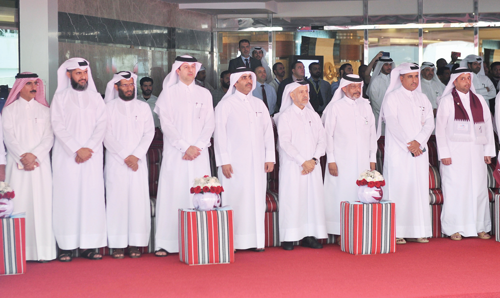 President of Kahramaa, Eng. Essa bin Hilal Al Kuwari (centre), and other officials attending celebrations of Qatar National Day at Kahramaa Tower, yesterday. Pic: Baher Amin/The Peninsula