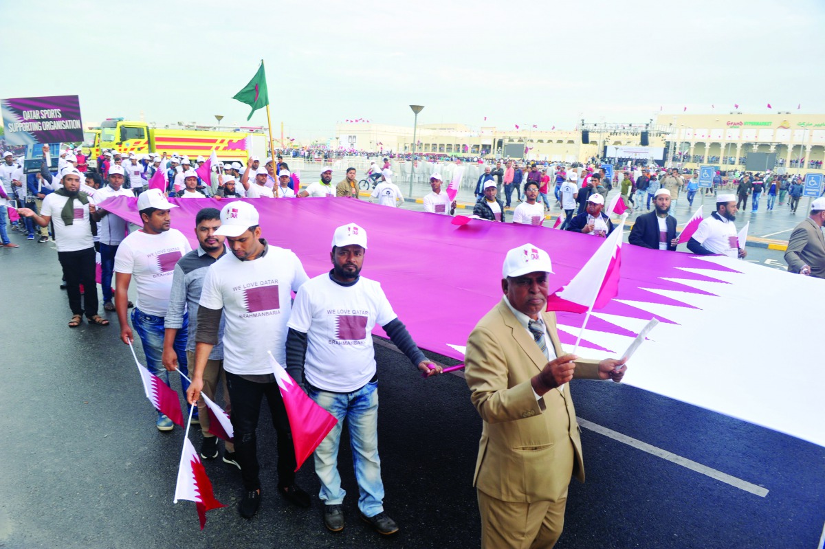 Indian and Bangladeshi communities taking part in parades to mark Qatar National Day in Asian Town. Pic: Abdul Basit/The Peninsula