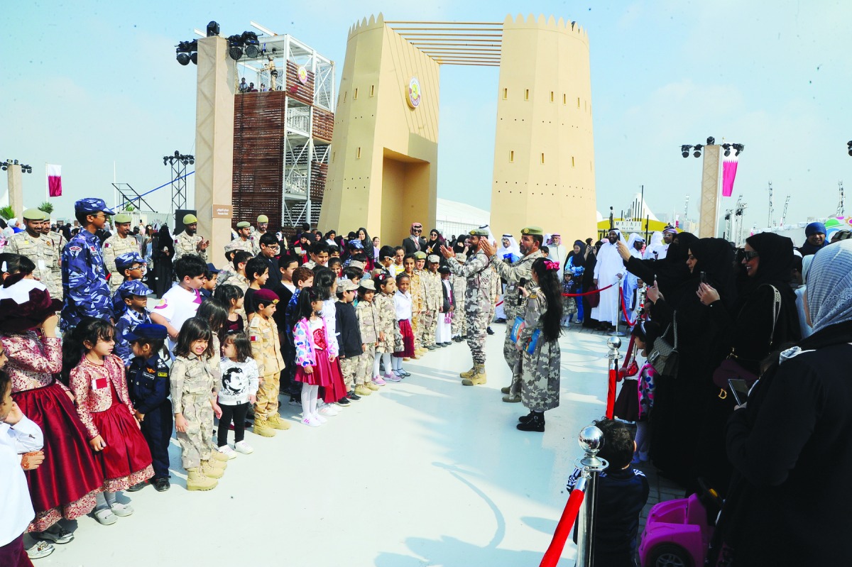 Visiting families, children and officials taking part in National Day festivities at Darb Al Saai. Activities will continue until 11pm today. 