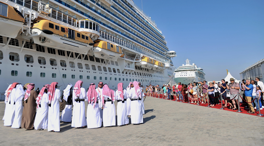 The thousands of tourists from the US on the Jewel of the Sea cruise ship being given a traditional welcome at Doha Port, yesterday. Pic: Baher Amin/The Peninsula
