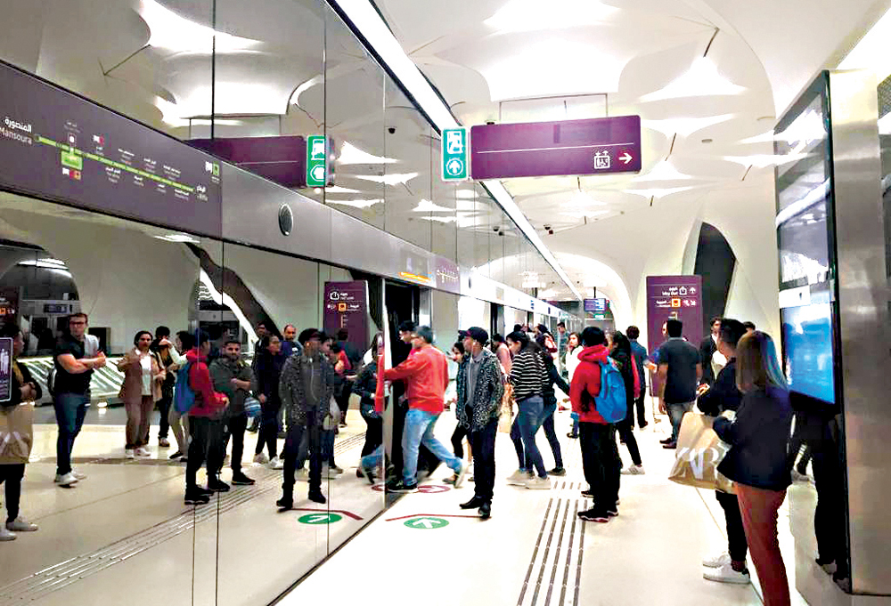 Doha Metro passengers boarding a train at Msheireb Metro Station. Pic: Abraham Augusthy/The peninsula