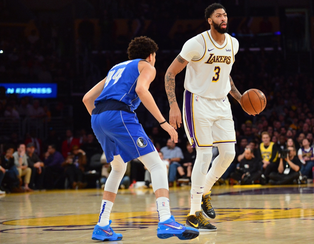 Los Angeles Lakers forward Anthony Davis (3) controls the ball against Dallas Mavericks forward Justin Jackson (44) during the second half at Staples Center. Gary A. Vasquez