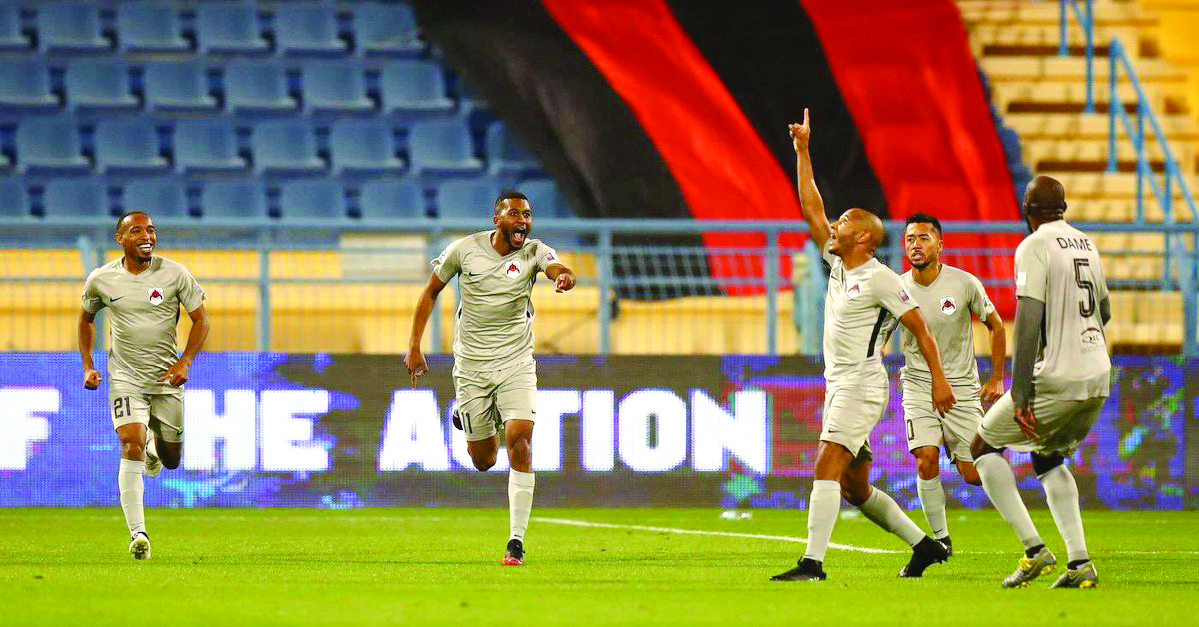 Al Rayyan's Yacine Brahimi (third right) celebrates with team-mates after scoring a hat-trick against Umm Salal during their QNB Stars league match played at the Al Gharafa Stadium, yesterday.