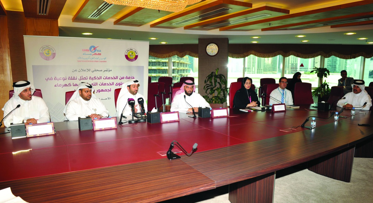 Officials from Kahramaa and the representatives from the Ministry of Justice, and the Ministry of Municipality and Environment attend a press conference held to announce the smart registration service at the headquarters of Kahramaa, yesterday.  Pic: Abdu