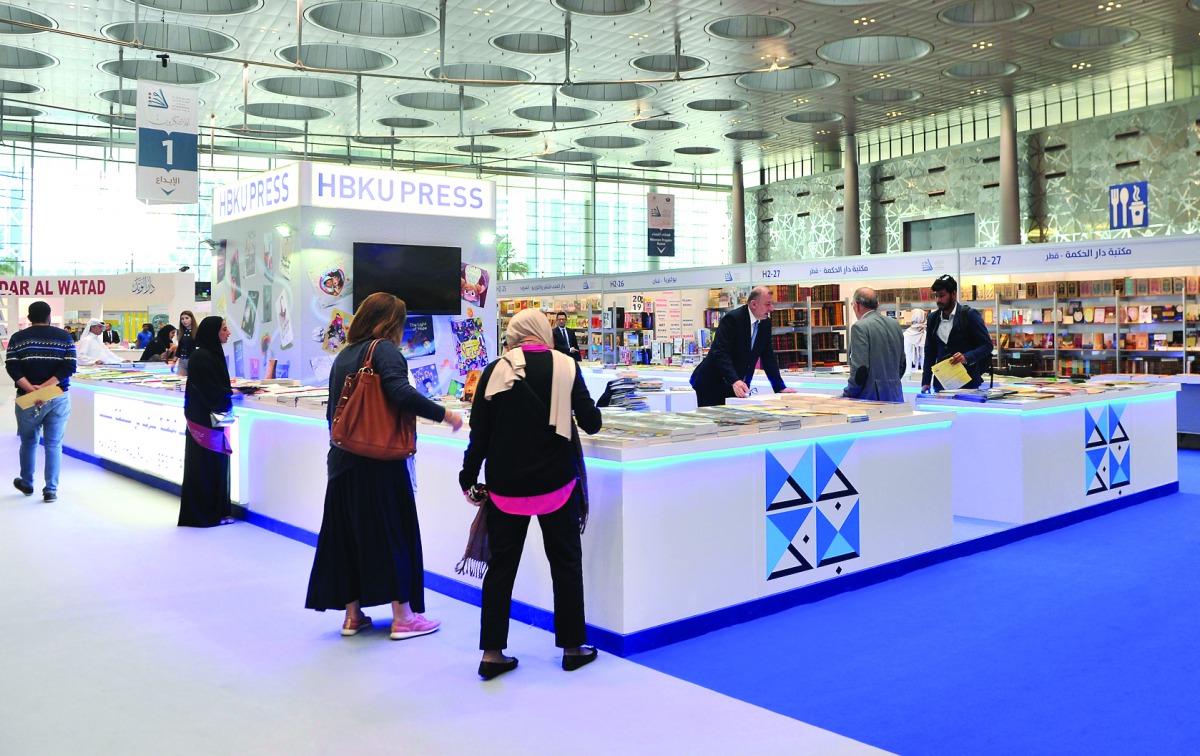 People visiting the HBKU Press pavilion at the 30th edition of the Doha International Book Fair at Doha Exhibition and Convention Center (DECC), yesterday.  Pic: Baher Amin / The Peninsula