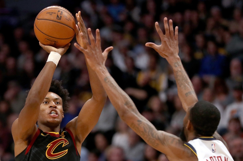 Collin Sexton #2 of the Cleveland Cavaliers puts up a shot against Will Barton III #5 of the Denver Nuggets in the fourth quarter at the Pepsi Center on January 11, 2020 in Denver, Colorado. Matthew Stockman/AFP 