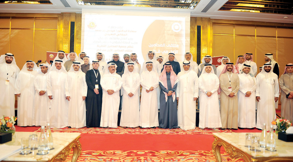 The Minister of Justice and Minister of State for the Council of Ministers Affairs, H E Dr. Issa bin Saad Al Jafali Al Nuaimi (centre), and Rashid bin Nasser Al Nuaimi, Chairman of the Qatar Lawyers Association, with other lawyers and officials at the ope