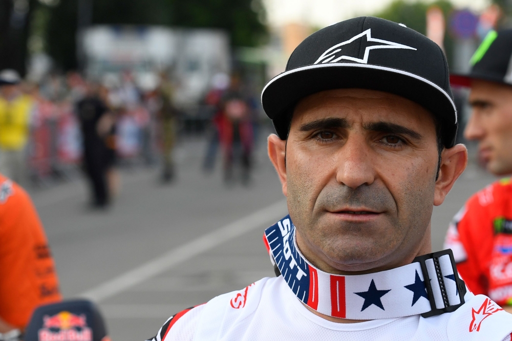 This picture, taken on July 06, 2019, shows the Hero 450 Rally rider, Portuguese Paulo Da Silva Goncalves during the podium ceremony on July 6, 2019 on the eve of the start of Silk Way Rally 2019 from Irkursk (Russia) to Dunhuang (China) through Mongolia.