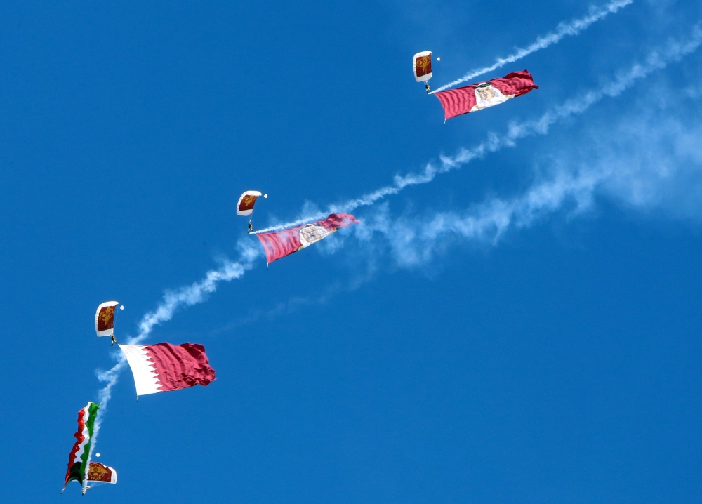 Members of Qatar's air sport committee performs during the Kuwait aviation show in Kuwait City on January 15, 2020.(AFP / YASSER AL-ZAYYAT)
