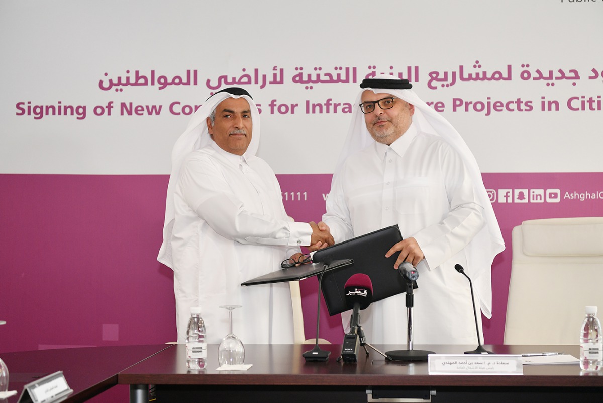 Dr. Eng. Saad bin Ahmed Al Mohannadi (right), President of the Public Works Authority, during the signing ceremony at Ashghal headquarters, yesterday. Pic: Abdul Basit/The Peninsula 