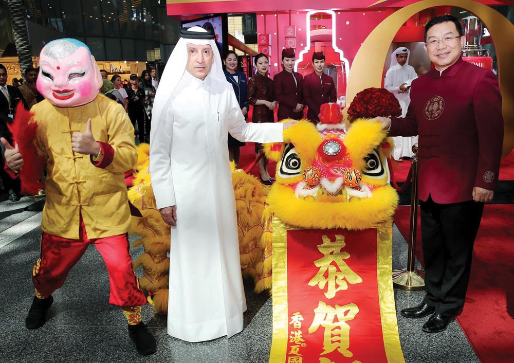 Qatar Airways Group Chief Executive and Secretary-General of QNTC, H E Akbar Al Baker, and H E Zhou Jian, Chinese Ambassador to the State of Qatar, during the launch of Lancôme Pop-Up store at Hamad International Airport. 