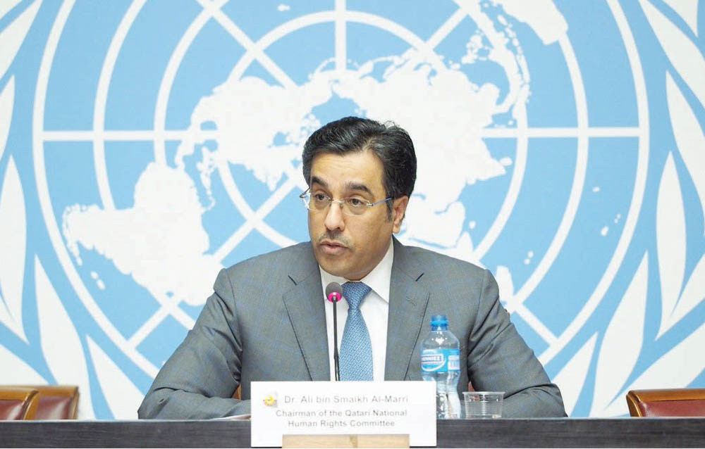 The Chairman of the National Human Rights Committee, H E Dr. Ali bin Smaikh Al Marri, speaking to reporters in Geneva. 