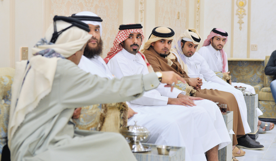 CMC member for Constituency 11, Saleh Al Nabet, and Officer from the General Directorate of Traffic, Lieutenant Ahmed Mohammed Al Kathiri with other traffic officers and CMC members, during a meeting at a private Majlis at Ein Khaled. PIC: BAHER AMIN/THE 