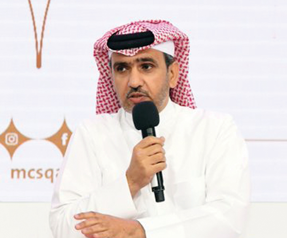 Colonel Jaber Mohamed Rashid Odaiba, Assistant Director of the Media and Traffic Awareness Department, speaking with youth during the Third Qatar Youth Forum at Ali bin Hamad Al Attiyah Arena.