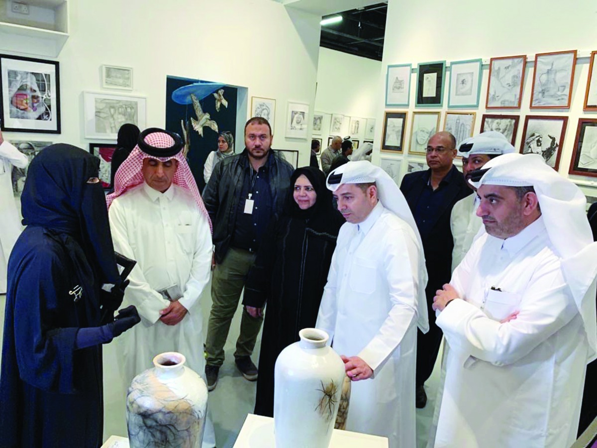 Minister of Education and Higher Education H E Dr. Mohammed bin Abdulwahed Al Hammadi touring the Exhibition at Katara, yesterday. Also seen are the Undersecretary at the Ministry of Education and Higher Education H E Dr Ibrahim bin Saleh Al Nuaimi and ot