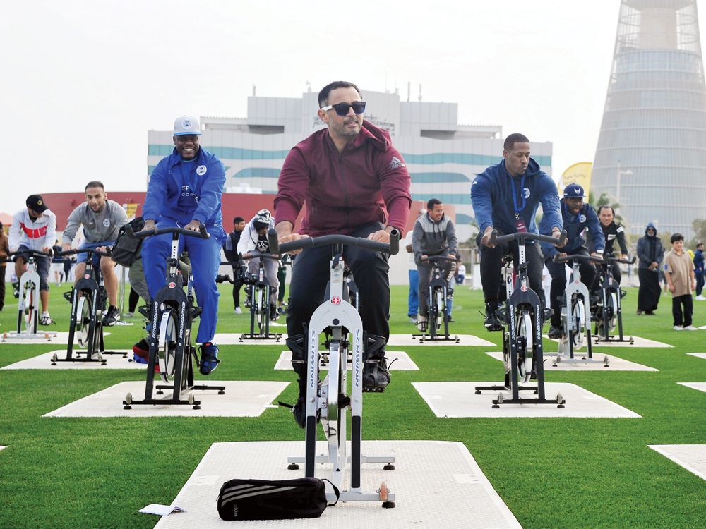 Chief Executive Officer of Aspire Zone Foundation, Mohammed Al Suwaidi, takes part in Qatar National Sports Day activities at Aspire Park, yesterday. Pic: Abdul Basit/The Peninsula