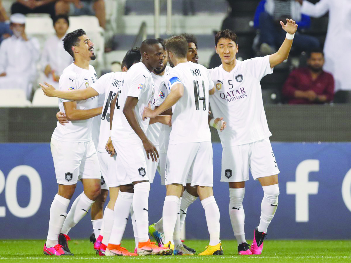 Al Sadd's players celebrate after scoring against Sepahan yesterday.