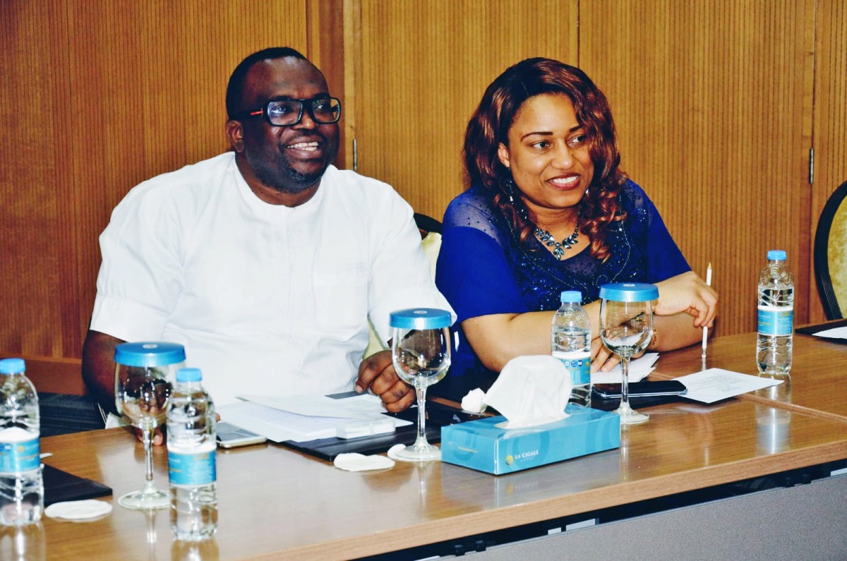 Viktor Ikoli (left), President of NIDO-Qatar, with a member of the community during the meeting.